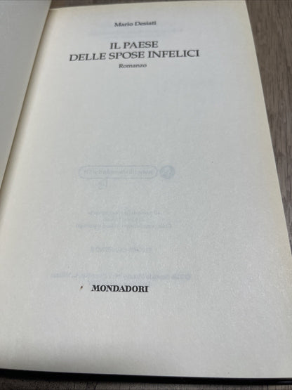IL PAESE DELLE SPOSE INFELICI - Hardcover ( Italian) **Very Good Condition**