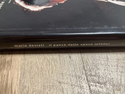 IL PAESE DELLE SPOSE INFELICI - Hardcover ( Italian) **Very Good Condition**