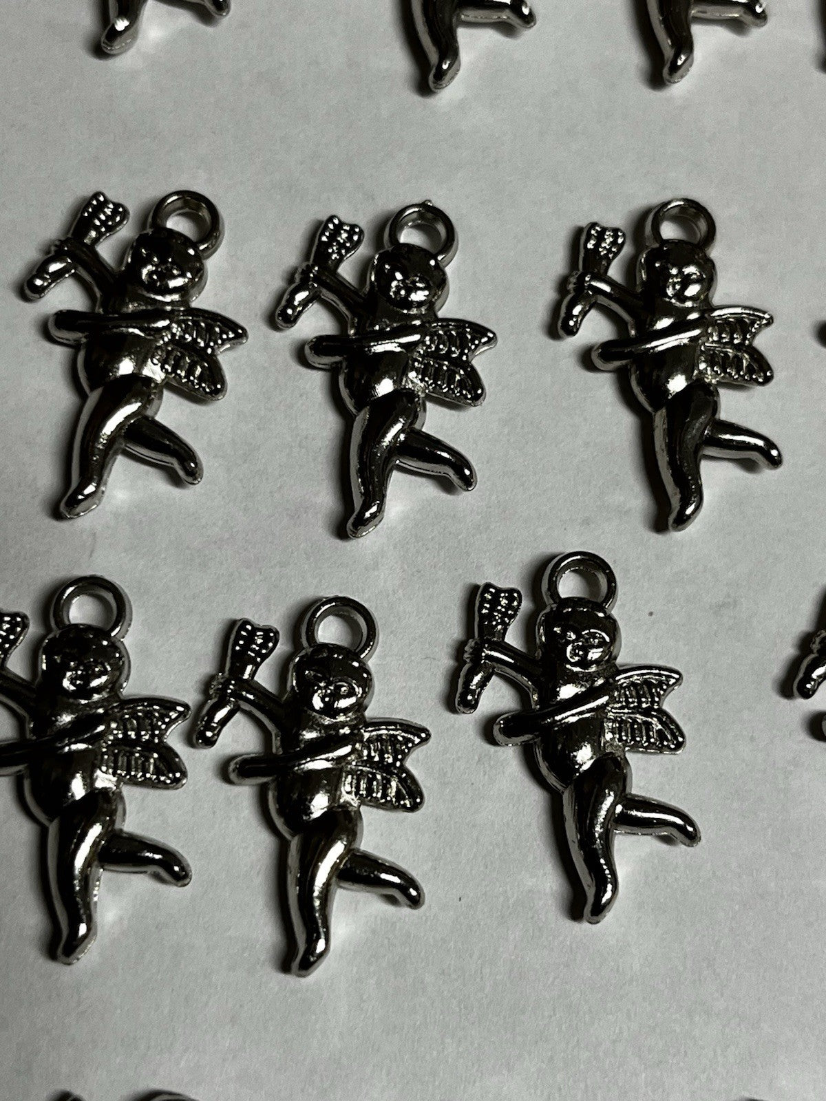 35  VINTAGE Antique Silver FLYING CHERUB CUPID W/ ARROW 28x17mm. ACRYLIC CHARMS