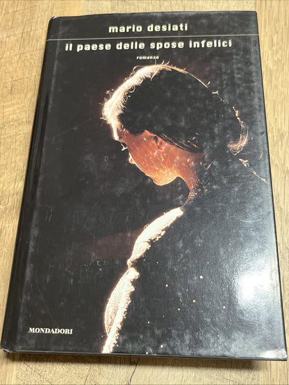 IL PAESE DELLE SPOSE INFELICI - Hardcover ( Italian) **Very Good Condition**