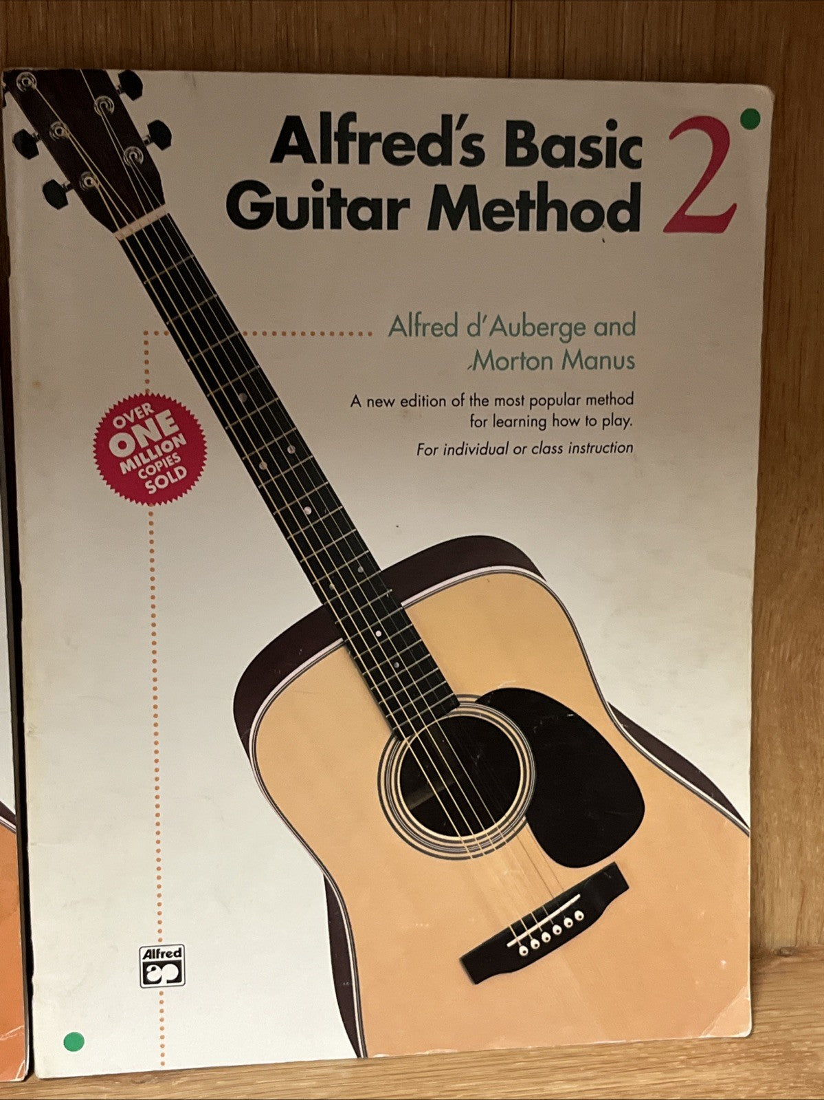 Alfred's Basic Guitar Method 1 and 2 by Alfred d'Auberge; Morton Manus 1990 & 92