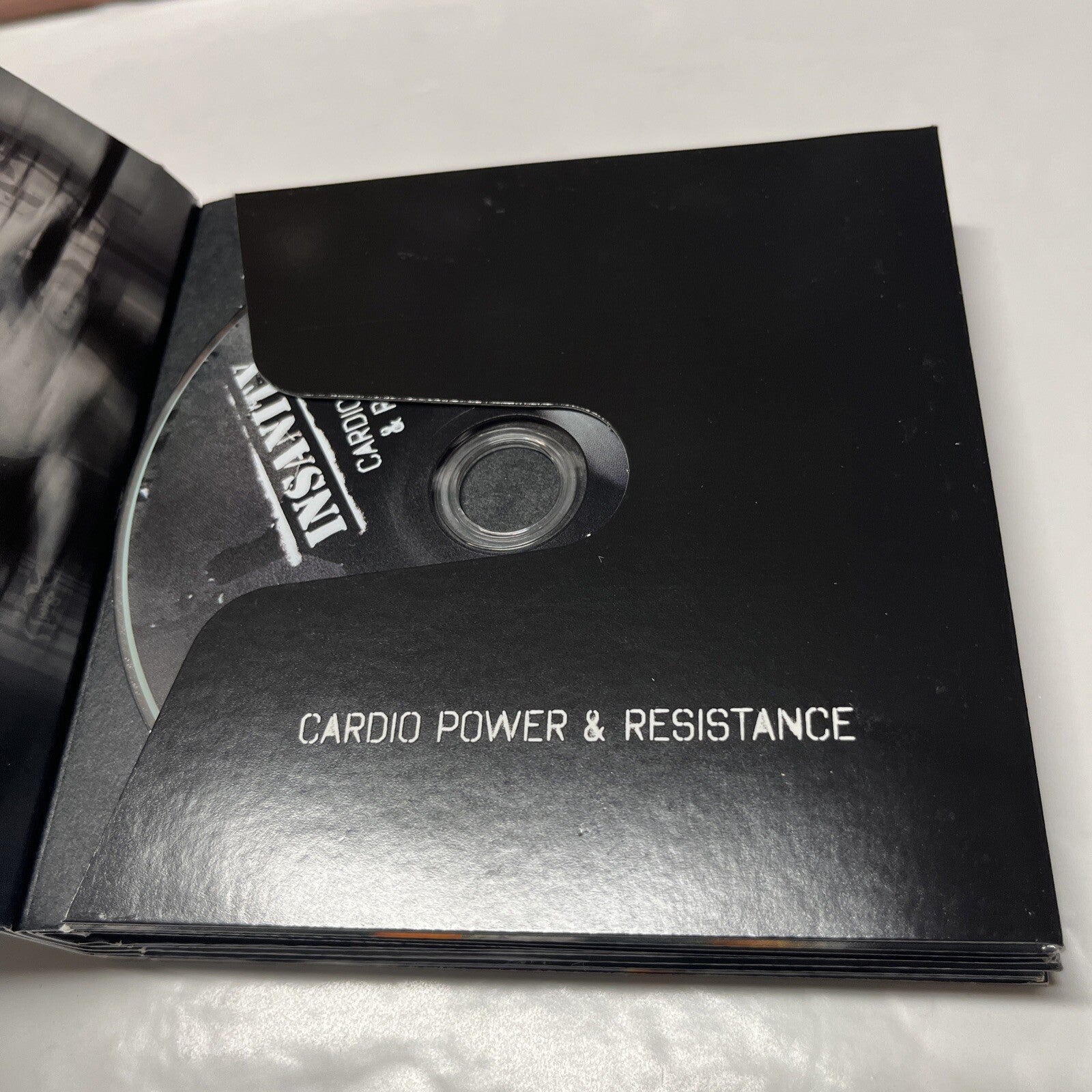 Insanity: Ultimate Cardio Workout (9 Disc)  Missing Dig deeper & Fit Test